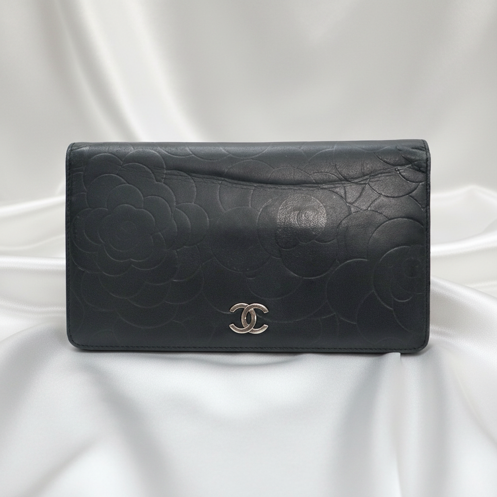 CHANEL Black Camellia Embossed Lambskin Leather
