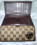 Gucci GG monogram wallet with heart GG