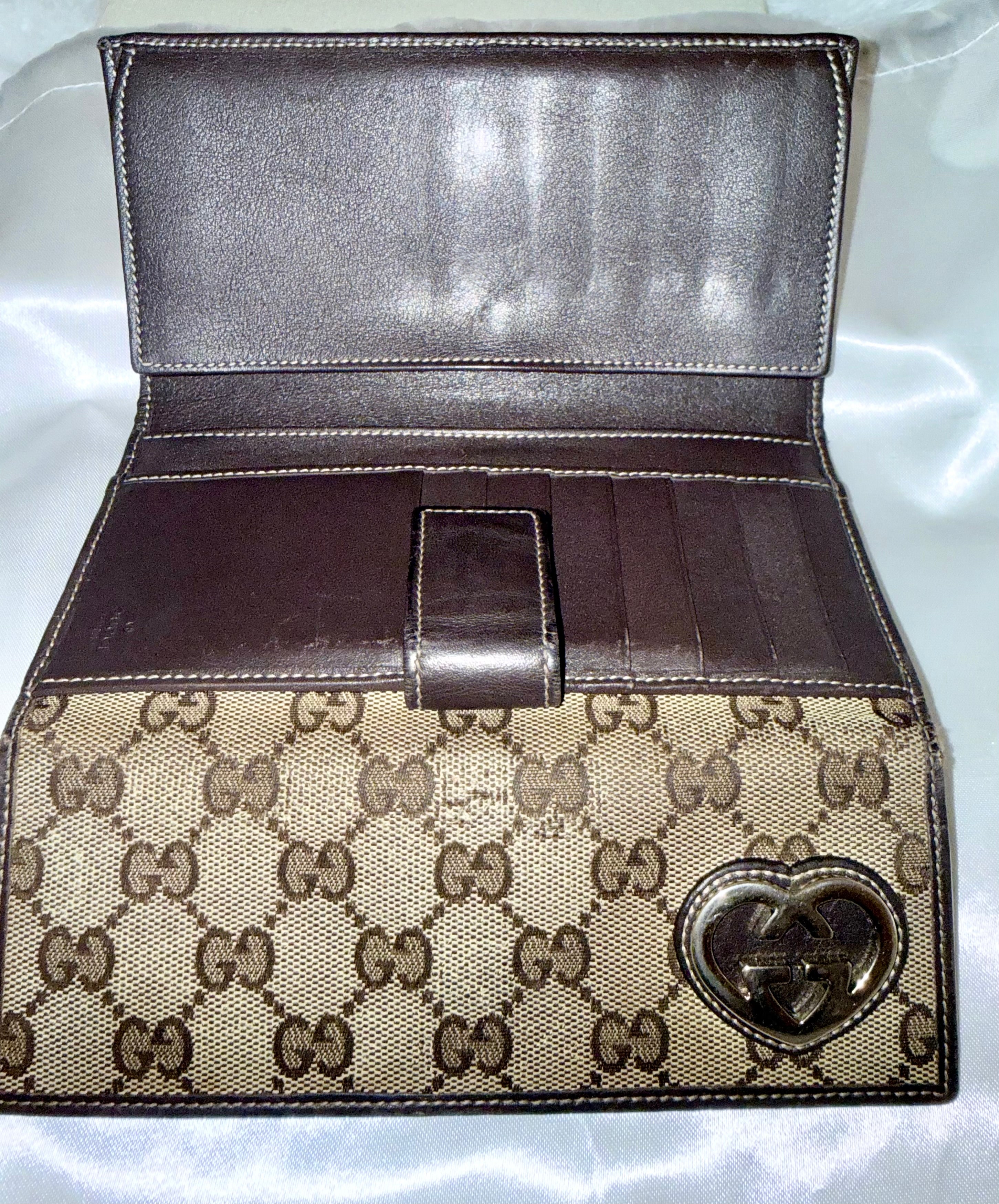 Gucci GG monogram wallet with heart GG