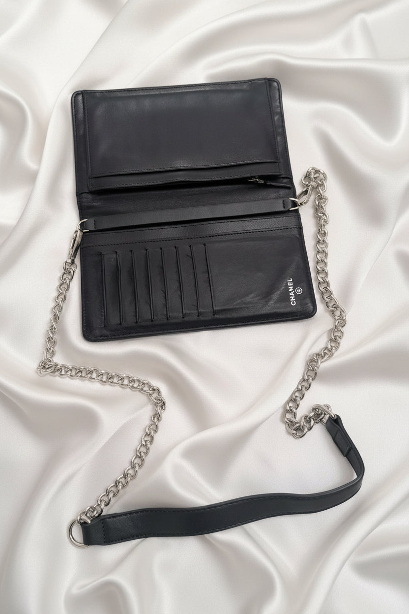 CHANEL Black Camellia Embossed Lambskin Leather