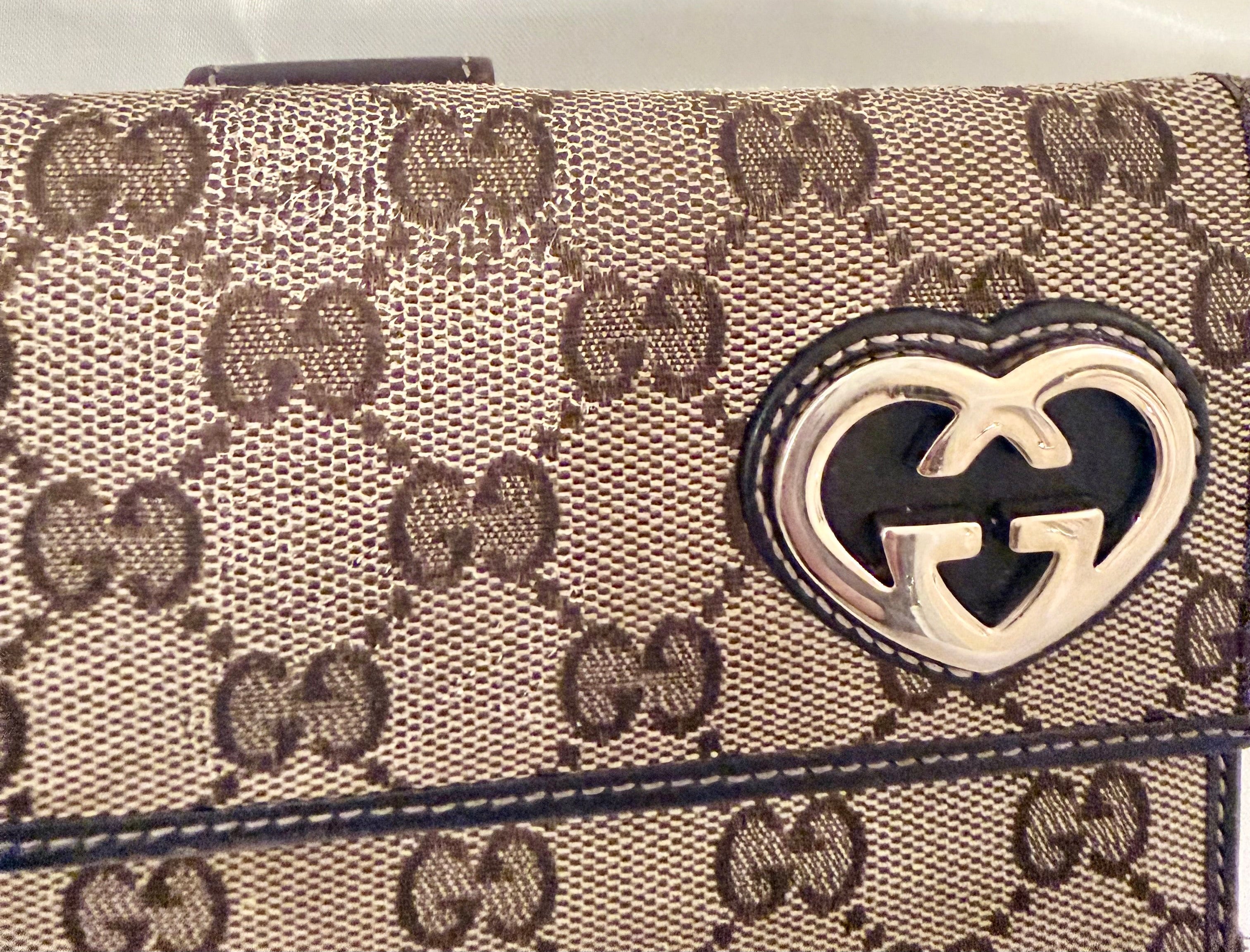 Gucci GG monogram wallet with heart GG