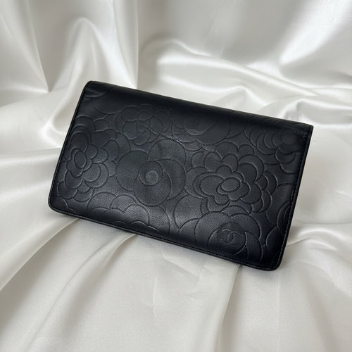 CHANEL Black Camellia Embossed Lambskin Leather