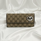 Gucci GG monogram wallet with heart GG