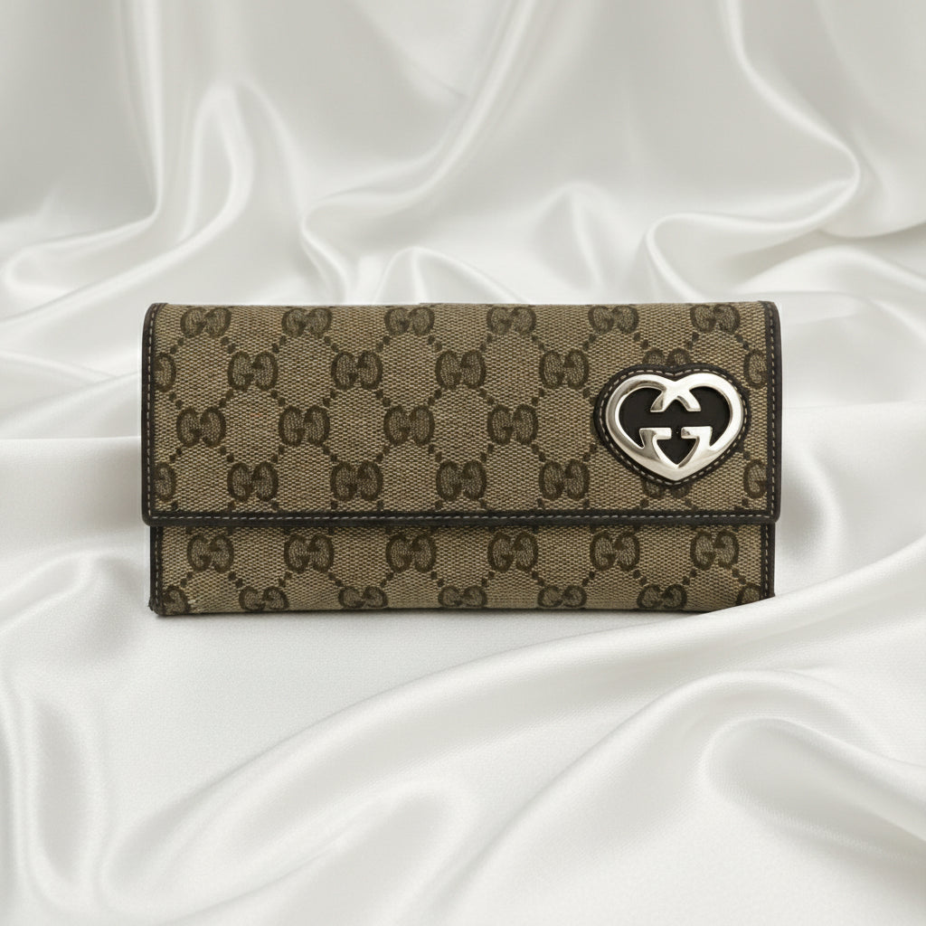 Gucci GG monogram wallet with heart GG