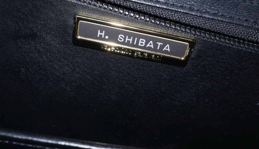 Valentino Garavani grainy calfskin VLogo signature clutch