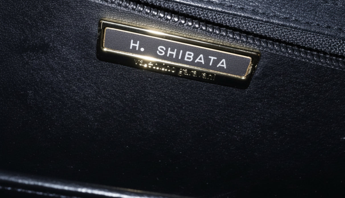 Valentino Garavani grainy calfskin VLogo signature clutch